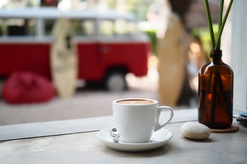 Hot coffee with a serving is prepared for the tourists who come to the sea in the morning.
