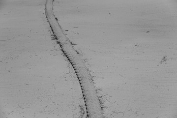 Swing rope on the sand, black and white