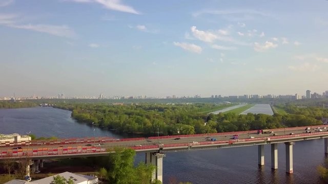 Aerial view in the area of Mitino, North and South Tushino, Pavshino, Silver Boron Park. Moscow River Canal, a view of the cityscape.