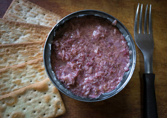 can of crumbled tuna with water biscuits