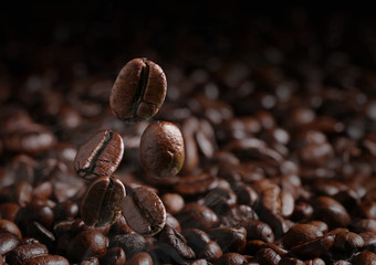 Coffee beans that are falling, close up