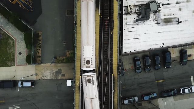 Drone shot of a departing train at Coney Island New York