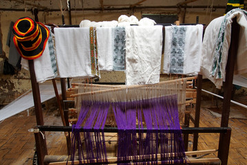 Hand-Woven Clothing hanging on a Line inside a Dorze Tribe Weaving Factory