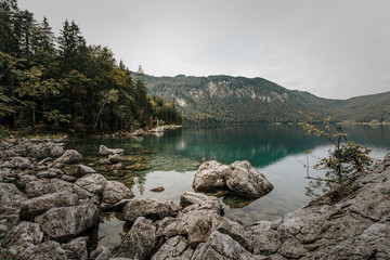 View over Eibsee lake just outside Garmisch-Partenkirchen on a gloomy cloudy day.