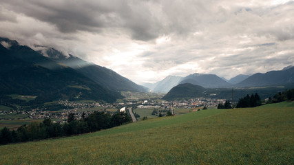 View over the Inntal valley on a cloudy gloomy day from the outskirts of Seefelt, Austria