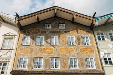 Fototapeta na wymiar Ornately decorated yellow building in Marktstrasse, Bad Tölz