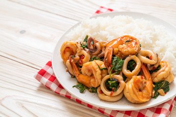 rice and stir-fried seafood with Thai basil