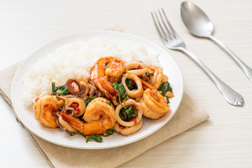 rice and stir-fried seafood with Thai basil