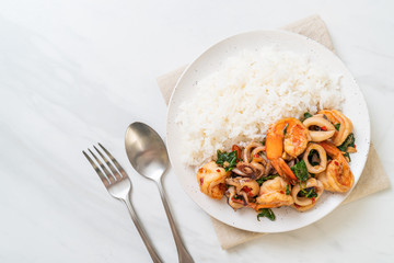 rice and stir-fried seafood with Thai basil