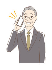 笑顔でスマホで通話する男性