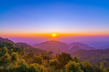 Beautiful sunrise and colorful blue sky over the hills and canyons in chiang mai,Thailand