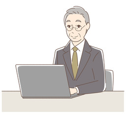 パソコンを操作して笑顔の男性