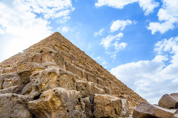 Fototapeta na wymiar Closeup view on a great pyramid of Cheops in Giza plateau. Cairo, Egypt