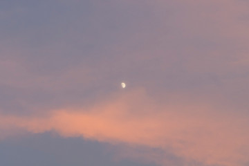 The moon and sky are mysterious.