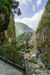 Fototapeta na wymiar Taroko national park canyon landscape in Hualien, Taiwan. Natural canyon and river view of Swallow Grotto (Yanzikou) hiking trail area. 