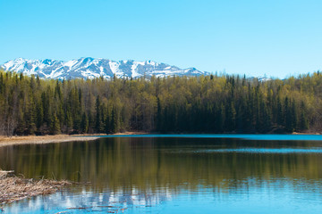 Refreshing spring day at a lake in Alaska.