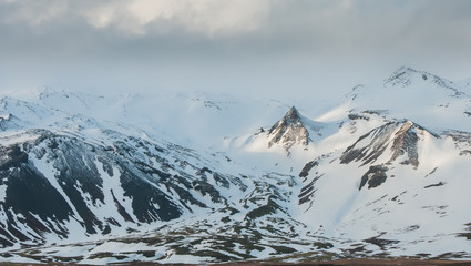 Snowy mountain landscape and Snaefellsnes peninsula in spring in Iceland