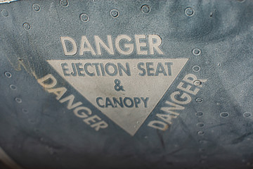 Danger sign as printed onto the fuselage of an f15 Eagle.