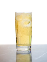 
A glass of beer placed on a white background