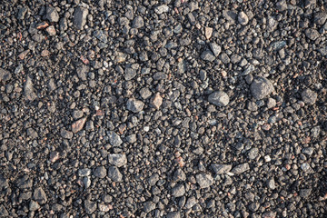 Background image of the surface of a gravel walking path