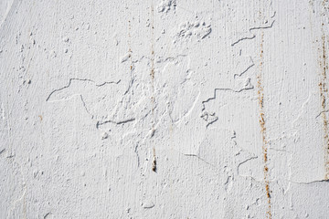 Background image of texture of painted concrete wall in cracks