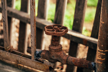 Old water tap is used as a bundle of metal structures