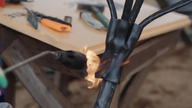 Close up for heat shrink tubing for the protection of cables isolation. Frame. Wires protection and isolation by heat shrink tubing.