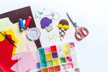 Toy made of felt. Ice cream and cake for games with a child.