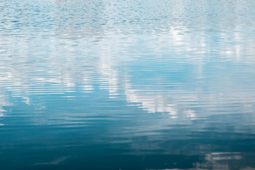 Clouds are reflected in the water, clouds in the sea.