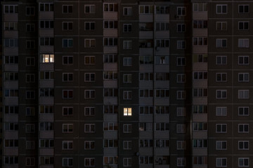 Flat night panorama of light in windows of multistory buildings. life in big city. concept for a...