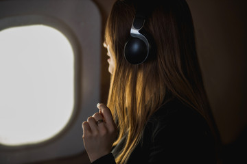 Attractive woman in private jet