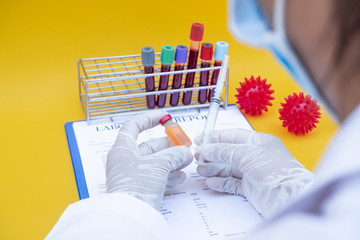 Professional doctors perform testing and analyzing samples of COVID-19 vaccines for immunization prevention and treatment from viral infections. Medical and health care concepts