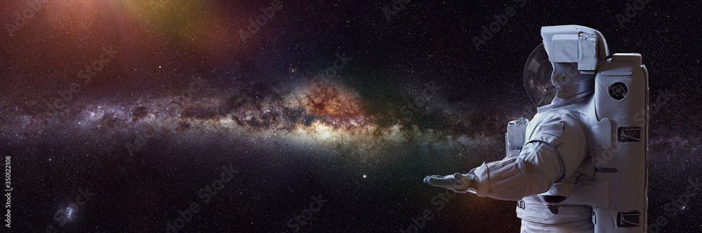 Sticker astronaut presenting an empty space in front of the milky way galaxy