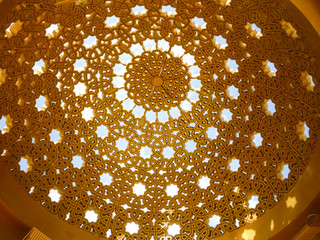 Beautiful Arabic or Arabian style dome with oriental stars in gold in Muscat, Oman in the Emirates