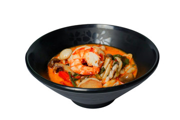 Thai food: Tomyum , Spicy soup with seafood isolated on white background with clipping path..
