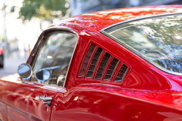 Classic old car parked in a street