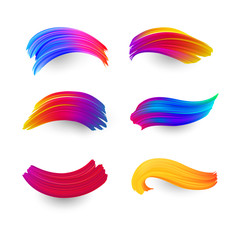 Bright gradient paint brush strokes set. Isolated Elements. Colorful spectrum brush design in pink, blue and orange colors isolated on white background. Vector illustration.