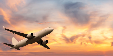 Fototapeta na wymiar passenger plane takes off in a beautiful sunset sky