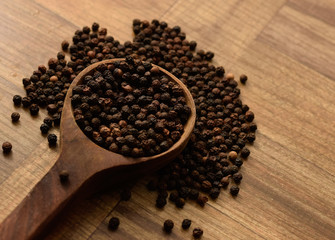 Pepper with wooden background