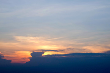 Obraz premium Sunset sky with dramatic clouds and beautiful dark blue cloud.