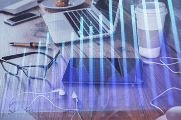 Double exposure of forex chart drawing and cell phone background. Concept of financial trading