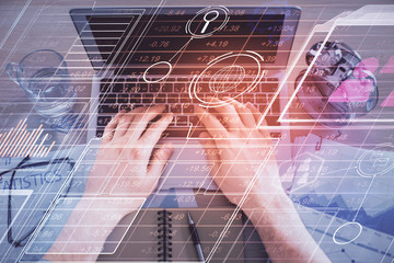 Double exposure of man's hands typing over computer keyboard and data theme hologram drawing. Top view. Technology concept.