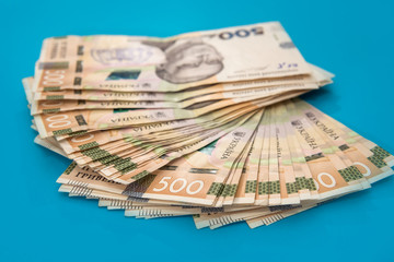 pile of 500 banknotes ukrainian money as financial background. Money and save concept