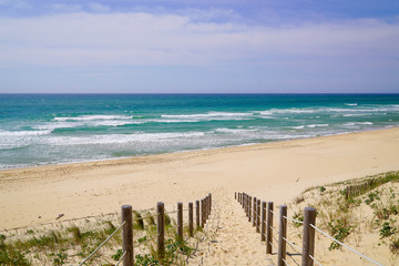 Fototapeta na wymiar path access dune sand beach of la jenny in atlantic ocean France