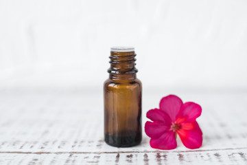 Geranium oil in glass dark bottles. Pelargonium oil. Aromatherapy