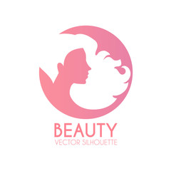 Hair care logo design. Female silhouette with long hair. Beauty design.