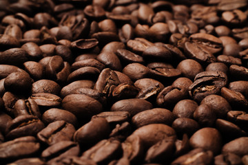 roasted coffee beans, can be used as background. Coffee production concept for coffee shop. Grains after roasting
