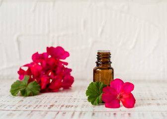 Geranium oil in glass dark bottles. Pelargonium oil. Aromatherapy