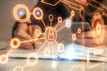 Double exposure of woman hands typing on computer and social network theme hologram drawing. People media concept.