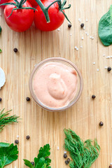 Aurora sauce for macaroni on a wooden background, top view